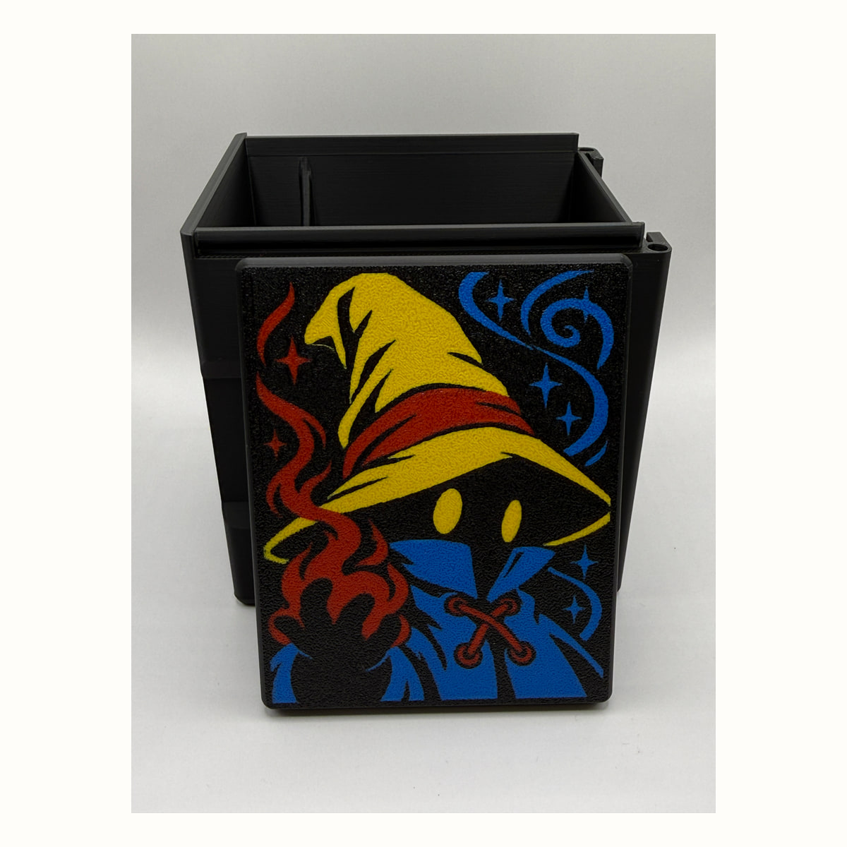 Vivi Ornitier / Mage: Vivi Ornitier / Mage printed lid artwork displayed in front of the open black box